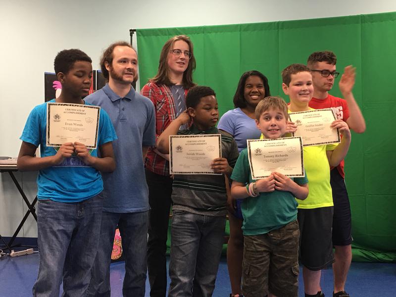 Students receiving Certificates of Accomplishment in a CADA class.